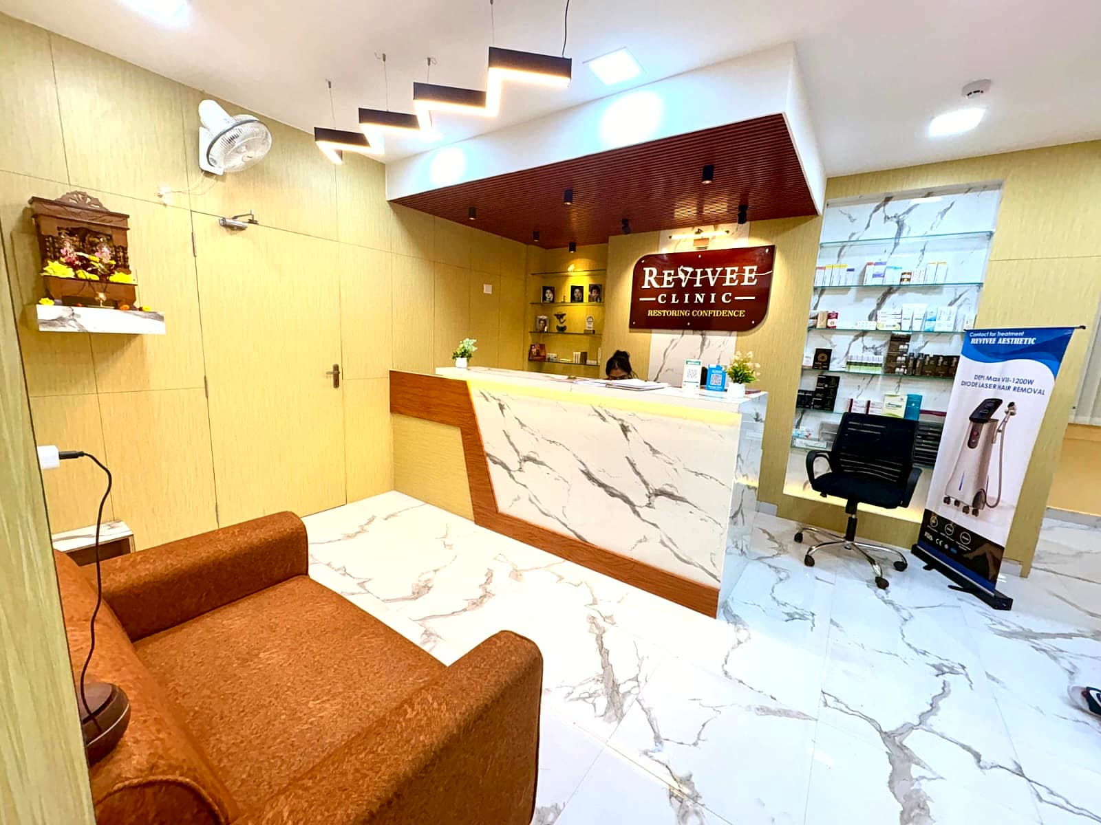 Revivee Clinics reception area with marble counter